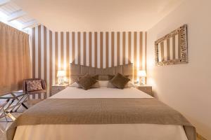 A bed or beds in a room at Apartment Terrazas La Caleta, Costa Adeje