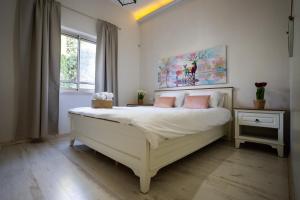 Voodi või voodid majutusasutuse Villa Magnolia in Manot toas