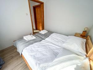 Gościniec Smrekowa Chata客房内的一张或多张床位