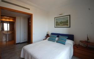 A bed or beds in a room at Lets Holidays Apartment Sea Views in Barcelona