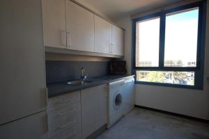 A kitchen or kitchenette at Lets Holidays Apartment Sea Views in Barcelona