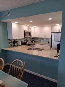 Kuchyň nebo kuchyňský kout v ubytování Oceanique Resort