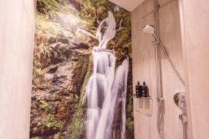Koupelna v ubytování Hotel Libertas elements pure