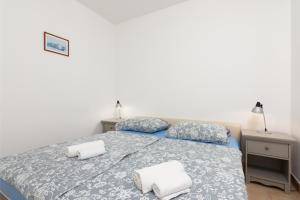 Postel nebo postele na pokoji v ubytování Apartments with WiFi Rovinj - 9702 + 23 fotografií