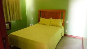 Postel nebo postele na pokoji v ubytování COBERTURA COM CHURRASQUEIRA E PISCINA.