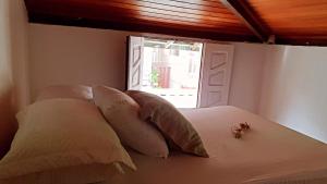 Ein Bett oder Betten in einem Zimmer der Unterkunft Cantinho da Luna