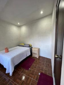 Hotel Berena客房内的一张或多张床位