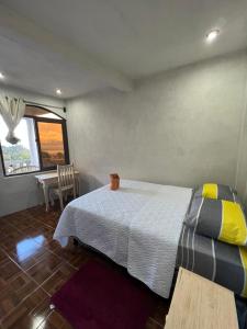 Hotel Berena客房内的一张或多张床位