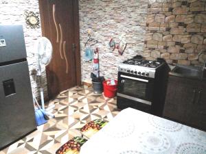 Kuchyň nebo kuchyňský kout v ubytování BLUE Hostel - check message after booking