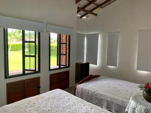 Voodi või voodid majutusasutuse Moderna cabaña en Viterbo con Aire AC y Piscina toas +28 fotot