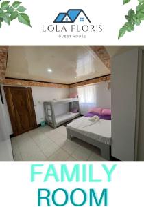 a picture of a family room in a house at Lola Flor's Guest House in El Nido
