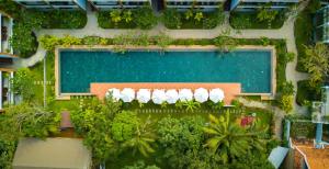 an aerial view of a swimming pool and a resort at Khmer House Resort in Siem Reap
