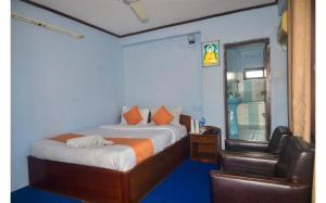 Una cama o camas en una habitación de Hotel Travel Inn