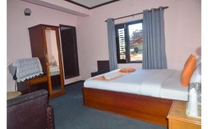 Una cama o camas en una habitación de Hotel Travel Inn