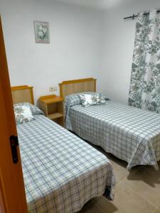 Katil atau katil-katil dalam bilik di Casa Rural Ardwina II