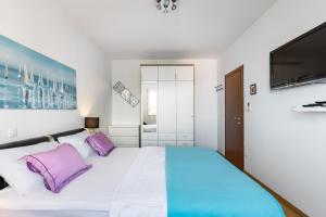 Posteľ alebo postele v izbe v ubytovaní Marina Lux Split