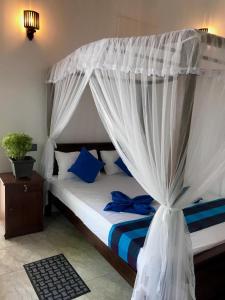 Postel nebo postele na pokoji v ubytování Bisandu guesthouse