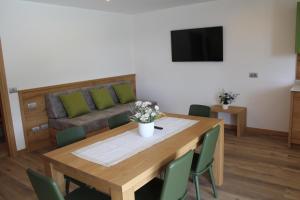 Μια τηλεόραση ή/και κέντρο ψυχαγωγίας στο Relais Dolomiti Appartamento