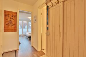 Postel nebo postele na pokoji v ubytování Strandduene Stranddüne Appartement 23