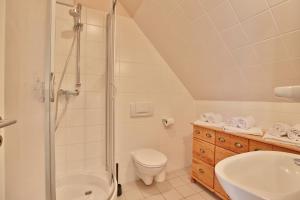 Koupelna v ubytování Strandduene Stranddüne Appartement 23