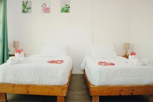 A bed or beds in a room at johandive
