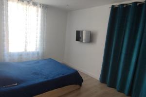 Posteľ alebo postele v izbe v ubytovaní Appartement au centre du monde selon Dali