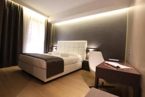 Letto o letti in una camera di Mokinba Hotels Baviera