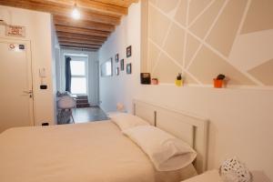Postel nebo postele na pokoji v ubytování Nell'Antico Borgo B&B