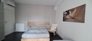 Postel nebo postele na pokoji v ubytování Efeso 19