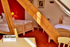 Postel nebo postele na pokoji v ubytování Hotel Saint-Hubert