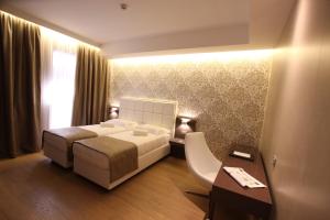 Letto o letti in una camera di Mokinba Hotels Baviera