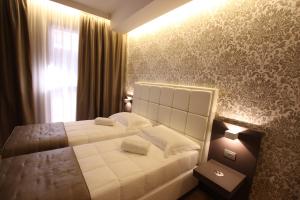 Letto o letti in una camera di Mokinba Hotels Baviera
