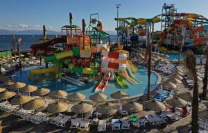 a water park with a water slide and slides at Feel the nature near to Viaport marina in Tuzla