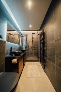 Kylpyhuone majoituspaikassa Appartement Pixel by ExplorHome