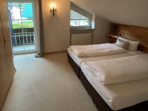 Fotografie z fotogalerie ubytování Chalet Jochpass Ferienwohnungen by HOTEL LANIG - Ferienwohnungen mit Zugang zum WellnessSpa im Hotel Lanig v destinaci Bad Hindelang