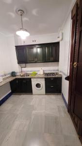 Kuchyňa alebo kuchynka v ubytovaní Apartamento San Benito A