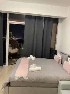 Кровать или кровати в номере Sublime Appartement Dubai