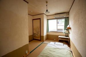Postel nebo postele na pokoji v ubytování Guesthouse Bon
