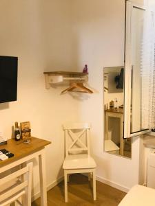 Kuchyň nebo kuchyňský kout v ubytování B&B Via dell'Azzurra