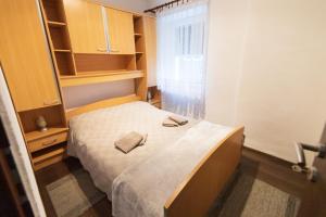 Postel nebo postele na pokoji v ubytování Apartman Mihelčić