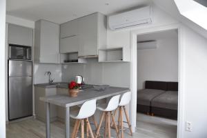 Kuchyňa alebo kuchynka v ubytovaní Zsolna Apartman
