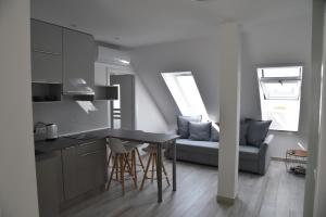 Kuchyňa alebo kuchynka v ubytovaní Zsolna Apartman