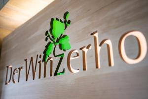 a logo is pictured at a store at Der Winzerhof in Achau