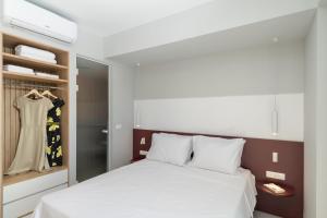 מיטה או מיטות בחדר ב-Evans Luxurious Apartment 2