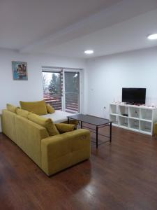 TV in/ali zabaviščno središče v nastanitvi Vila Banda