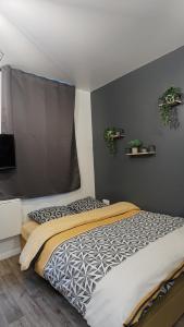 Posteľ alebo postele v izbe v ubytovaní Studio confortable au cœur de Rouen