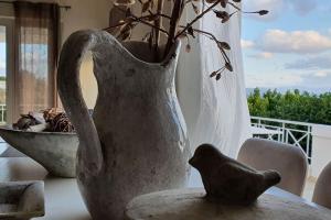 Posedenie v ubytovaní Βίλα με Υπέροχη Θέα Porto Cheli Villa Luxury Kounoupisea