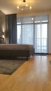 Ένα ή περισσότερα κρεβάτια σε δωμάτιο στο Beograd na vodi - BW Iris