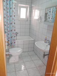 Kúpeľňa v ubytovaní Apartman Tomić - Copacabana Beach Okrug Gornji