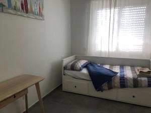 Letto o letti in una camera di Suite Dalmine